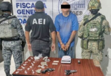 Catean inmueble en San Juan Guelavía; aseguran drogas, armas y detienen a un hombre