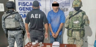 Catean inmueble en San Juan Guelavía; aseguran drogas, armas y detienen a un hombre